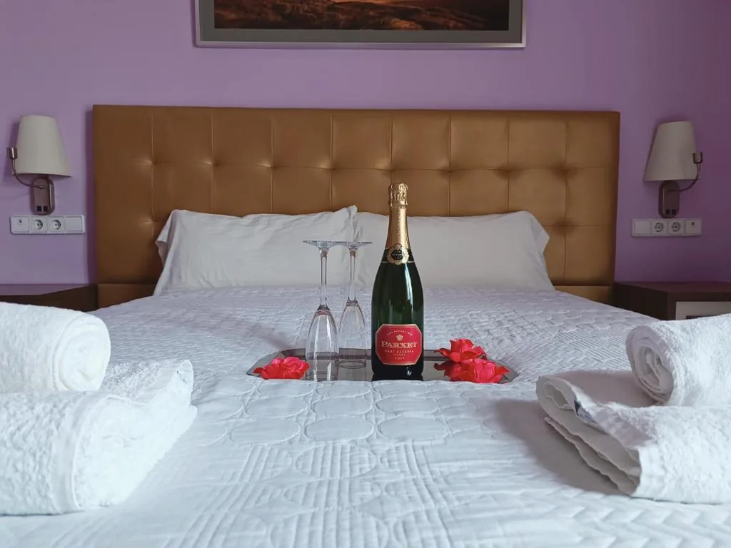 Suite Deluxe con vasca idromassaggio — Hotel Llar de Capitans