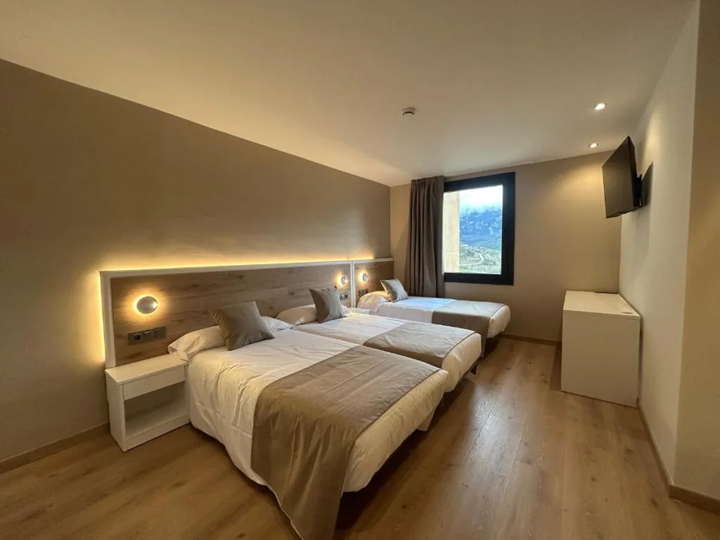 Dreibettzimmer mit Bergblick — Hotel Lord