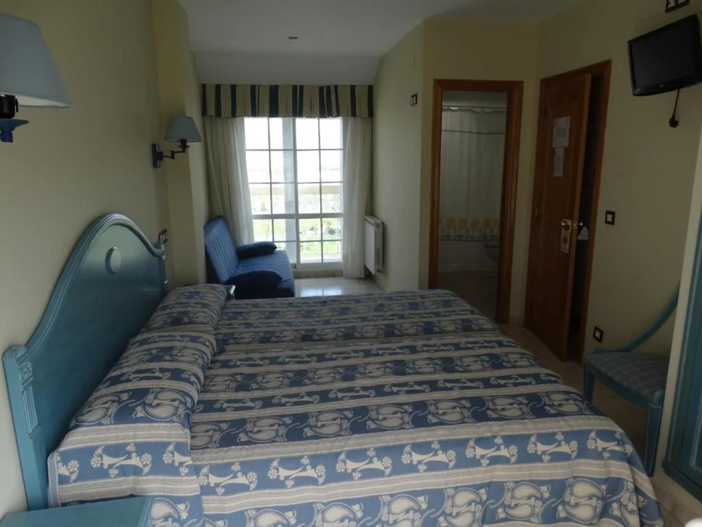 Camera doppia Deluxe (2 adulti + 1 bambino) — Hotel Los Juncos