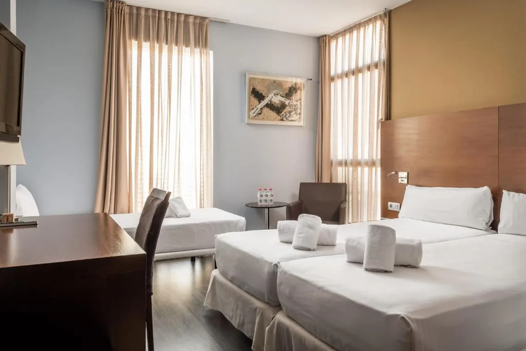 Camera tripla (2 adulti + 1 bambino) — Hotel Madanis