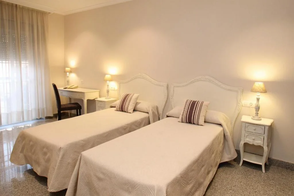 Suite Familiar con balcón — Hotel Maestranza