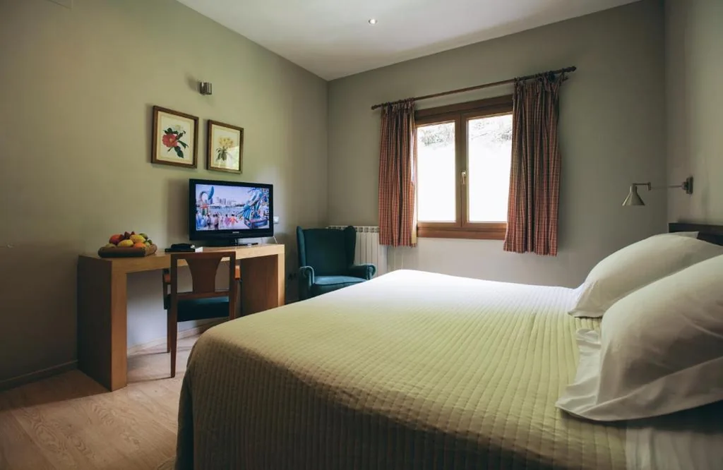 Habitación Doble con vistas al jardín — Hotel Manantial