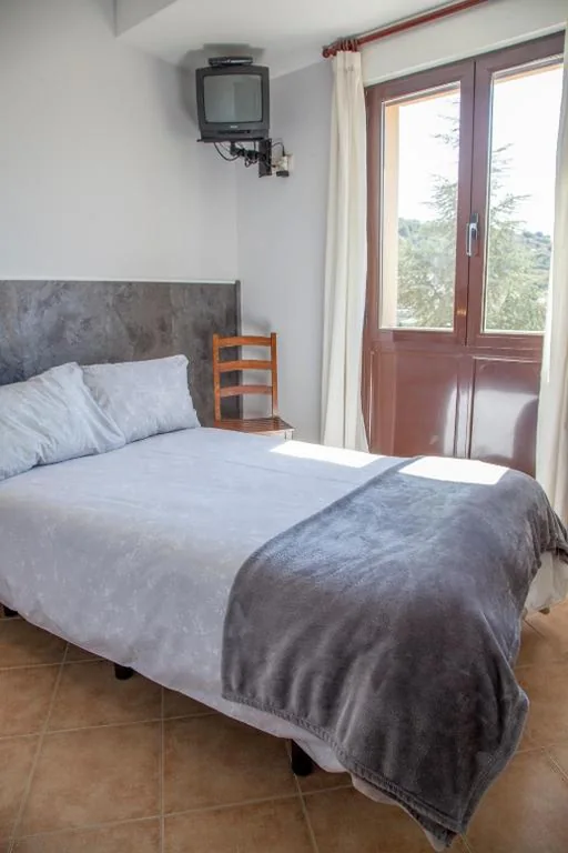 Habitación Individual — Hotel Mayno