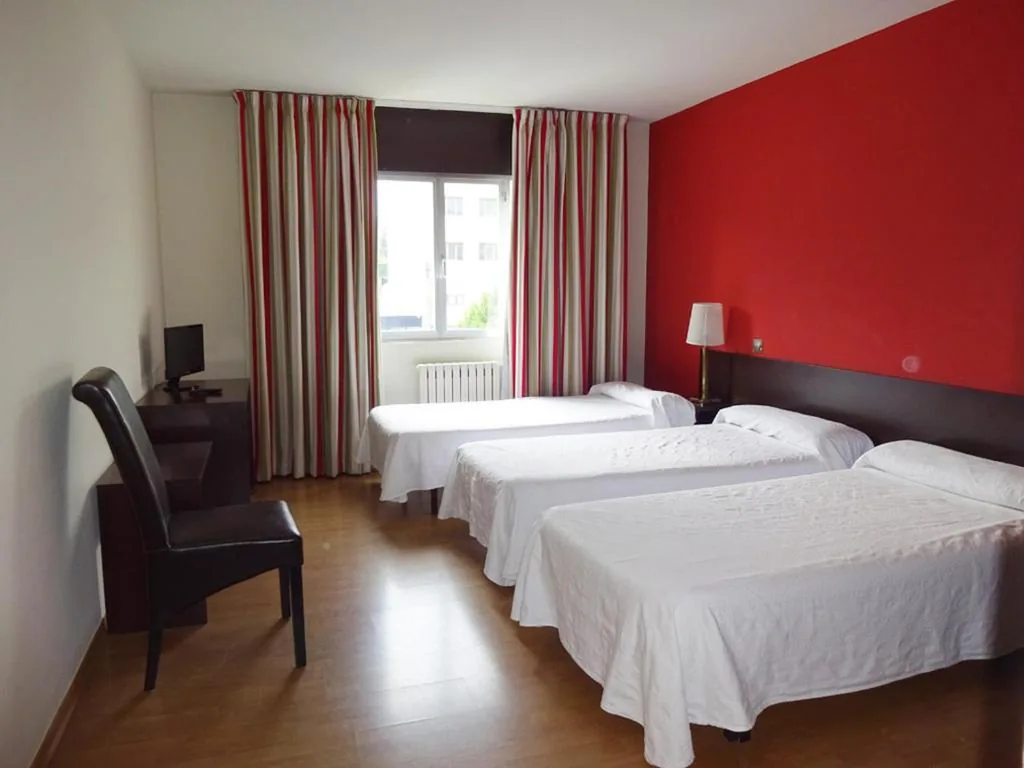 Dreibettzimmer — Hotel Millan