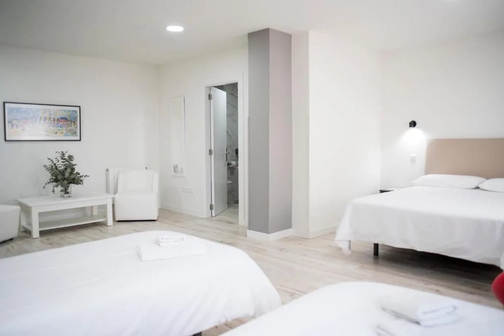 Habitación Cuádruple Clásica — Hotel Montañés