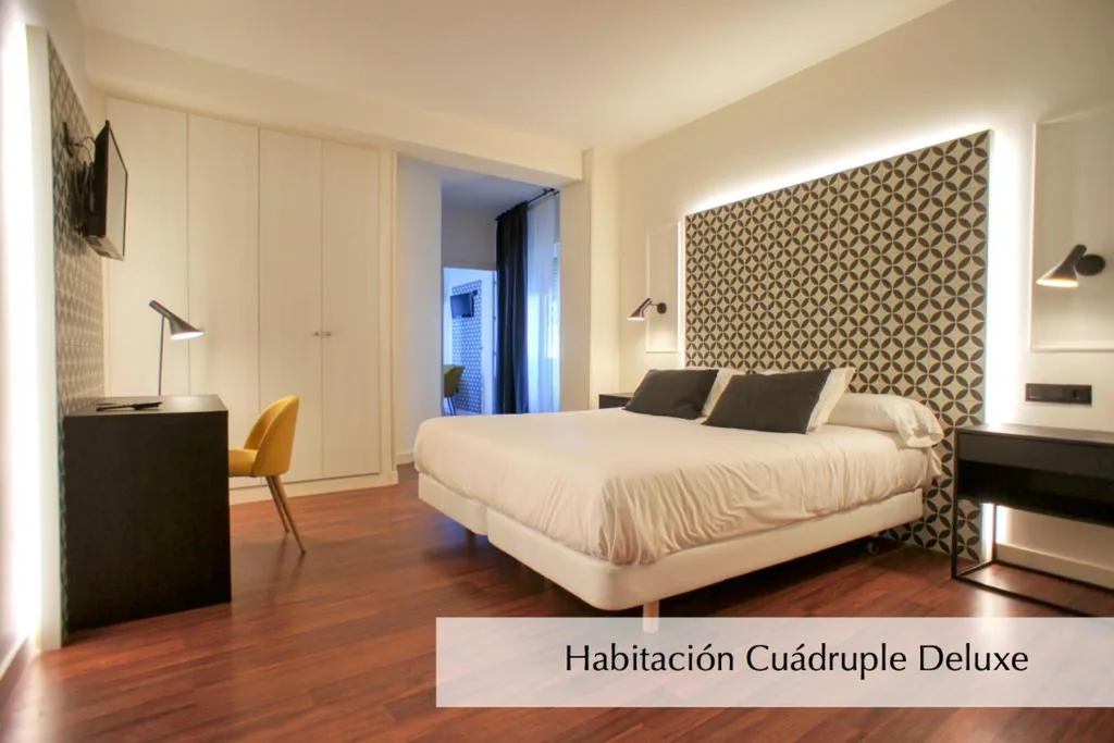 Habitación Cuádruple Deluxe — Hotel Montermoso