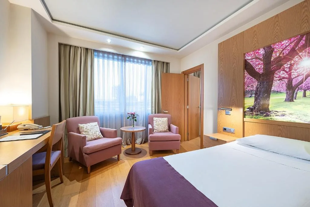 Quarto Quádruplo — Hotel Nelva