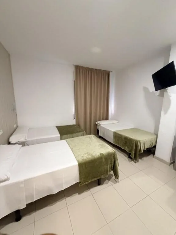Habitación Triple — Hotel Niza
