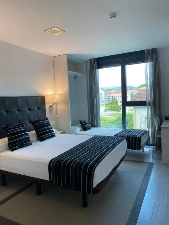 Quarto Duplo com cama extra — Hotel Noia