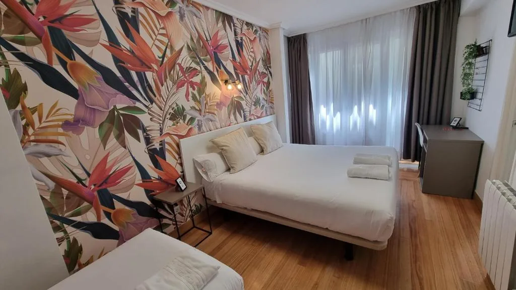 Doppelzimmer mit Zustellbett — Hotel Norte