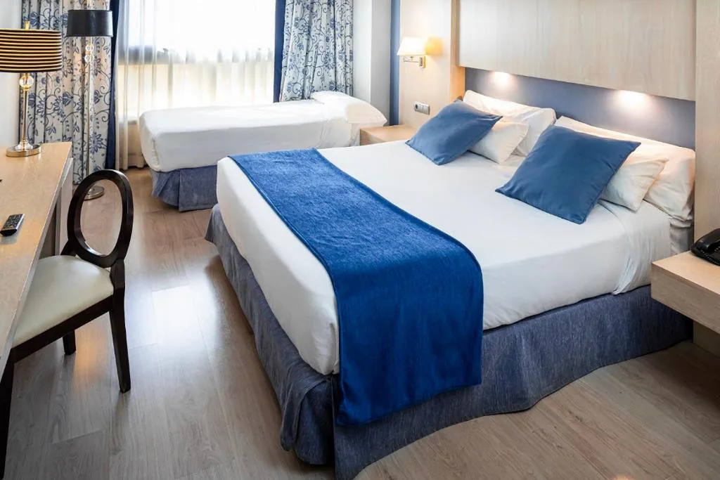 Camera tripla (2 adulti + 1 bambino) — Hotel Nuevo Boston