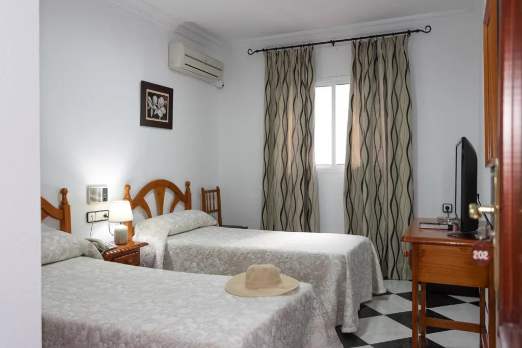 Quarto Duplo Económico - 1 ou 2 camas — Hotel Oasis