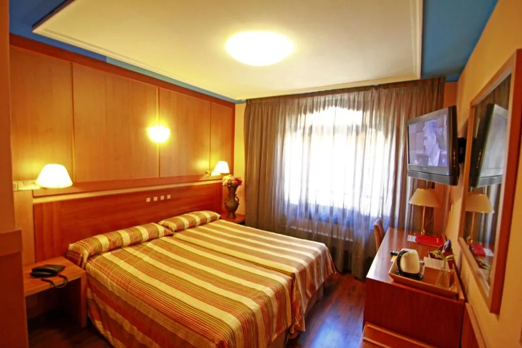 Habitación cuádruple — Hotel Paris Centro