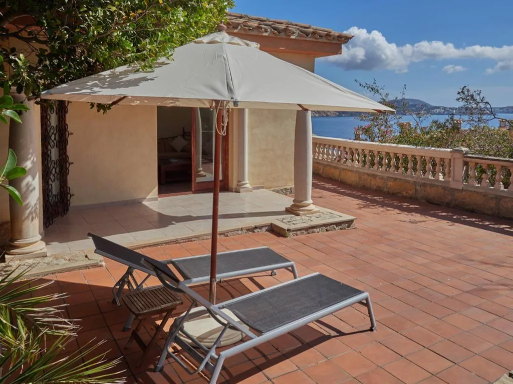Suite Deluxe (2 adultes + 1 enfant) — Hotel Petit Cala Fornells