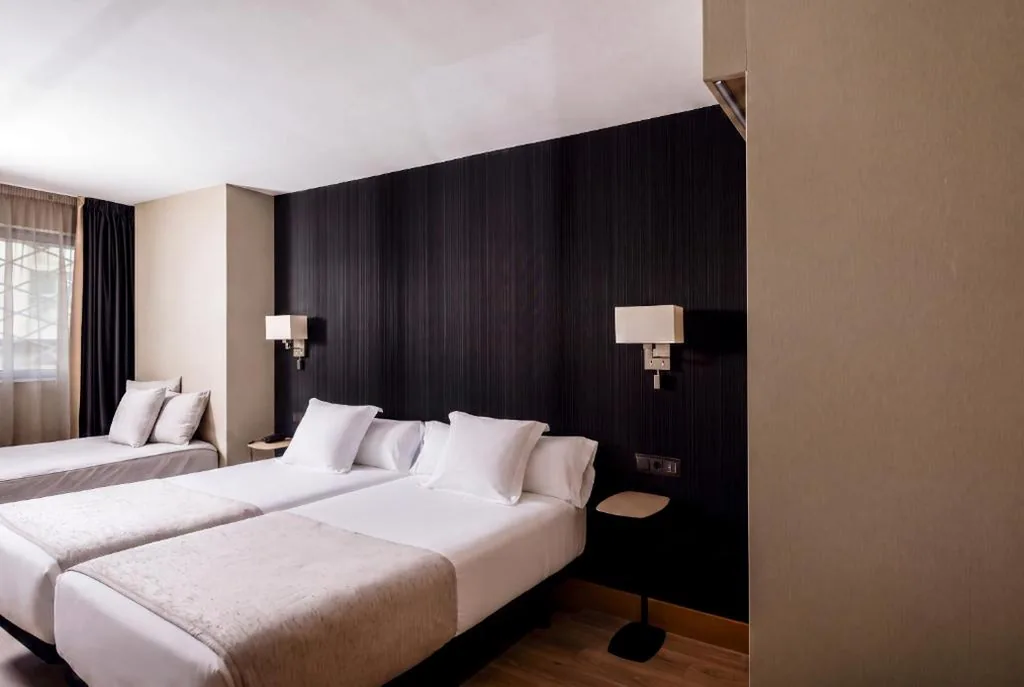 Chambre triple — Hotel Plaza