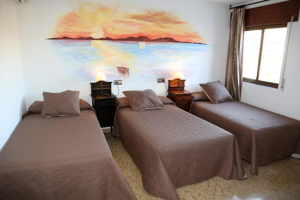 Triple Room — Hotel Puerta Nazarí