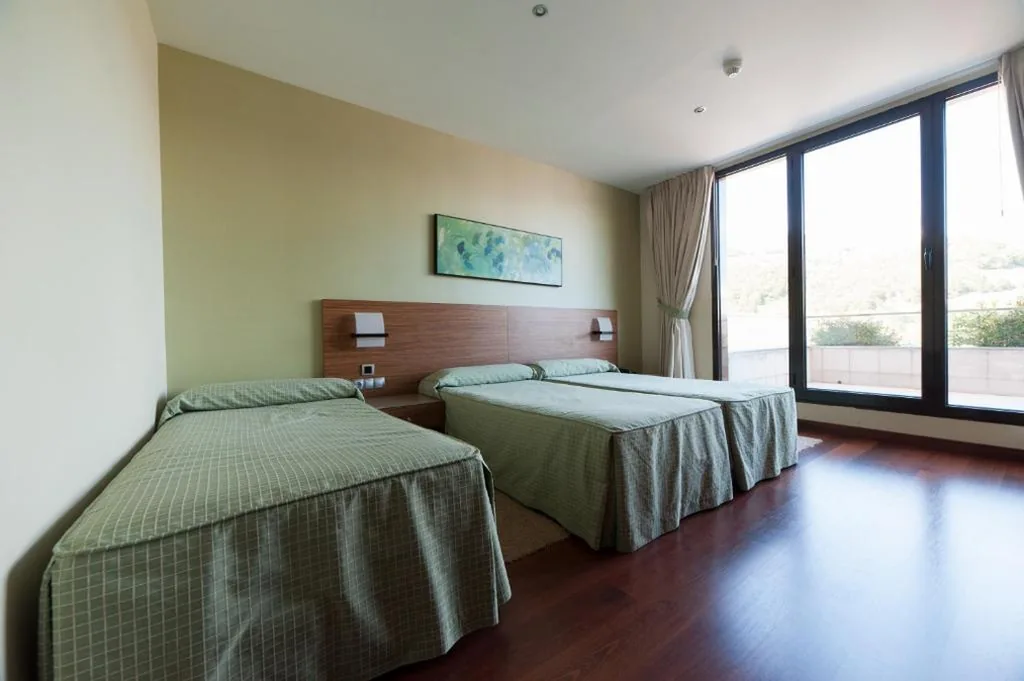 Dreibettzimmer — Hotel Restaurante Canzana
