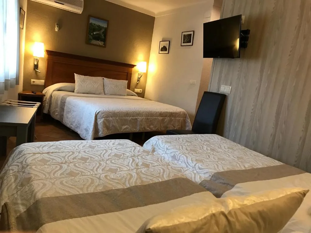 Habitación cuádruple — Hotel-Restaurante La Quadra