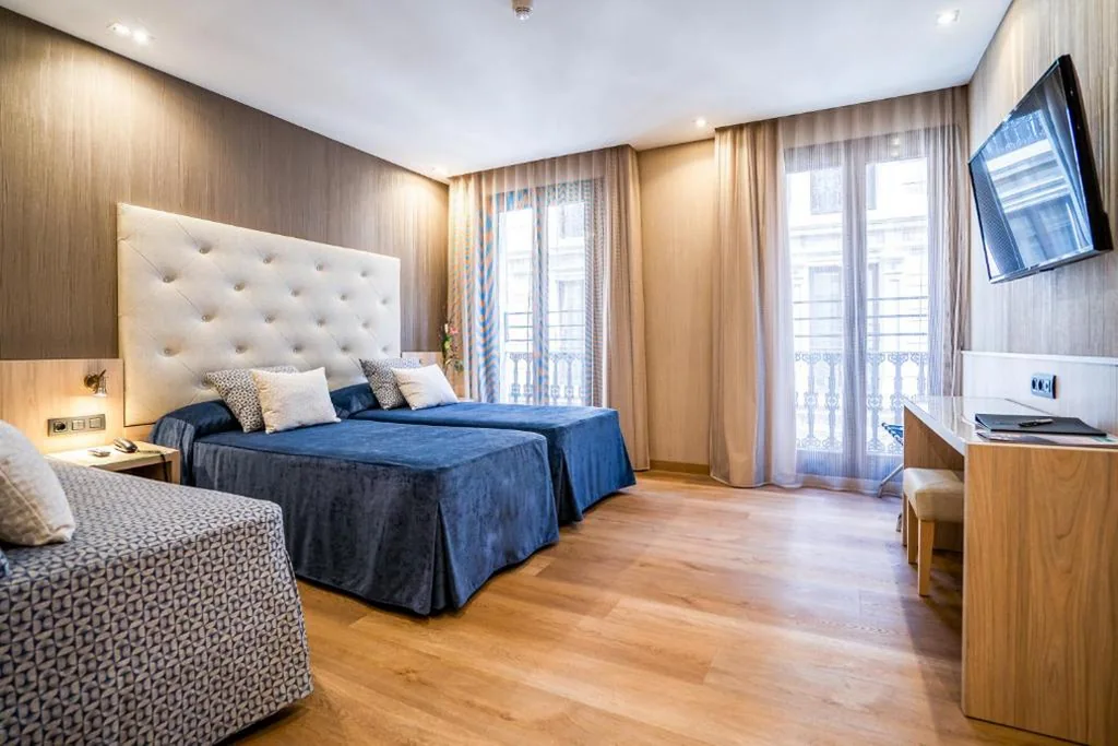 Doppelzimmer mit Zustellbett – 1 oder 2 Betten — Hotel Rialto