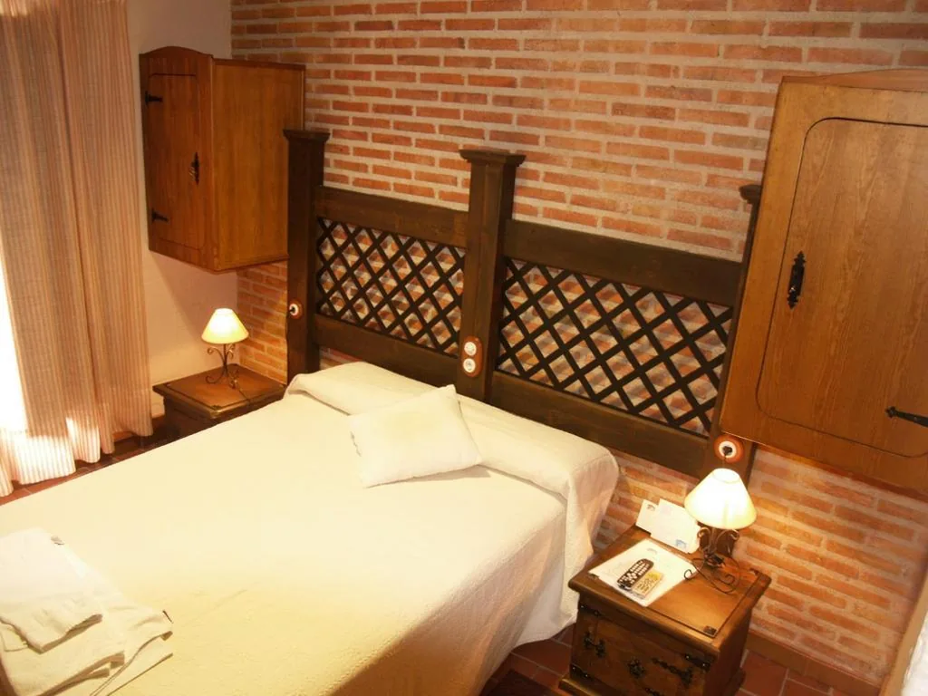 Habitación Cuádruple (2 habitaciones comunicadas) — Hotel Rural El Rocal