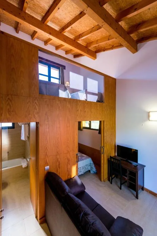 Quadruple Room with Garden View — Hotel Rural Fuentes Blancas