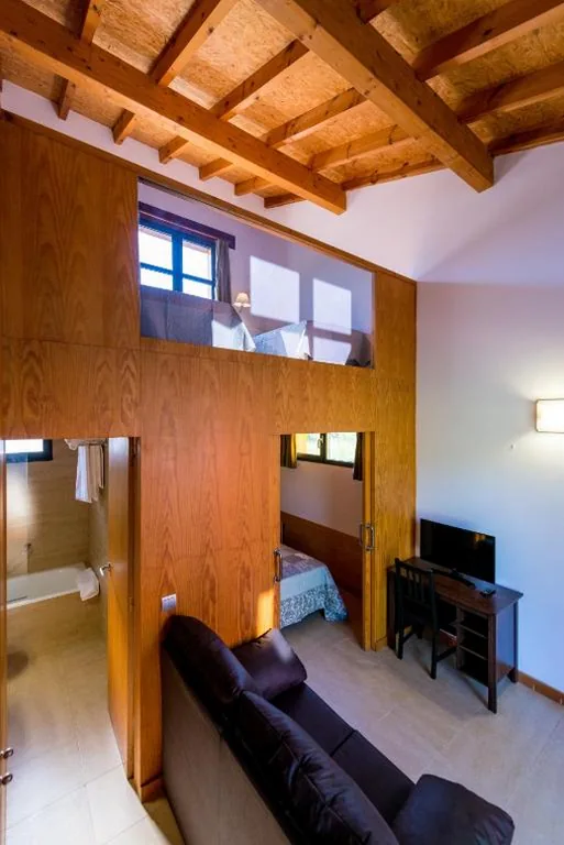 Quadruple Room with Garden View — Hotel Rural Fuentes Blancas
