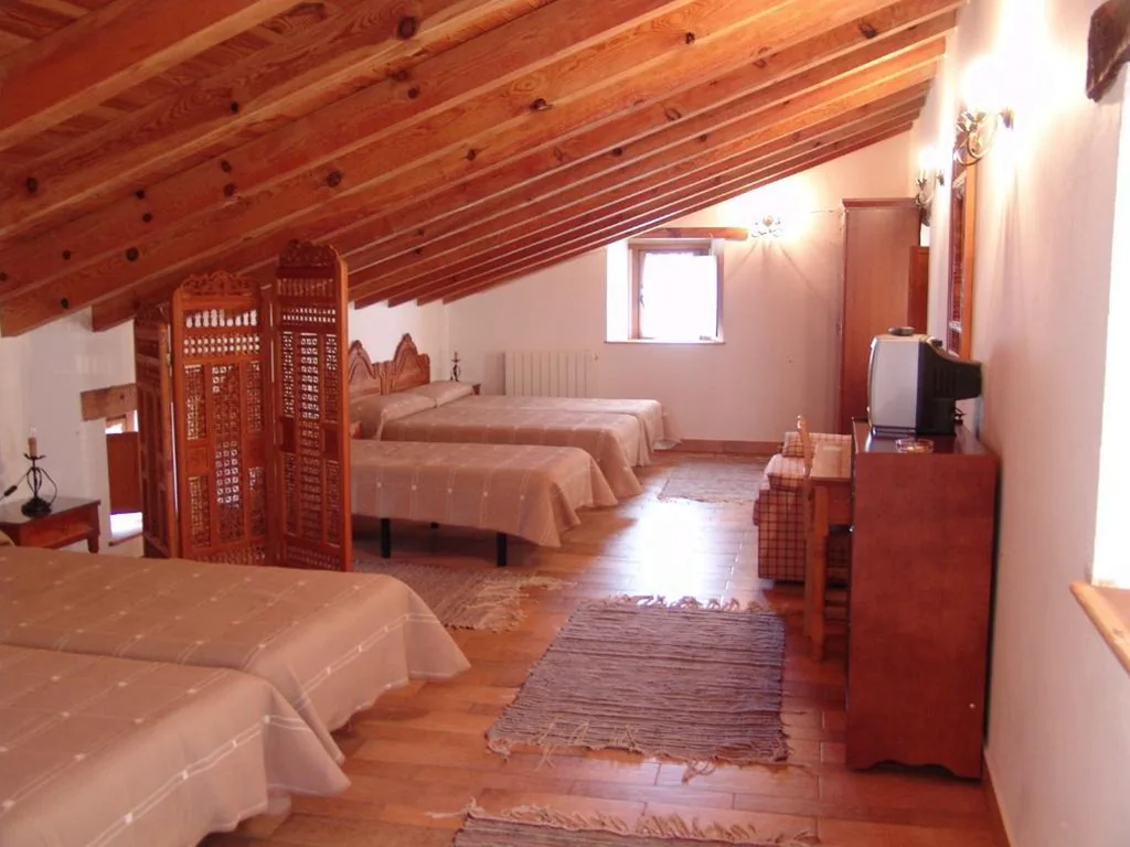 Habitación Familiar Ático — Hotel Rural La Puebla