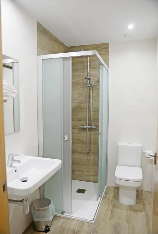Camera tripla con bagno privato — Hotel Rural Oasibeth