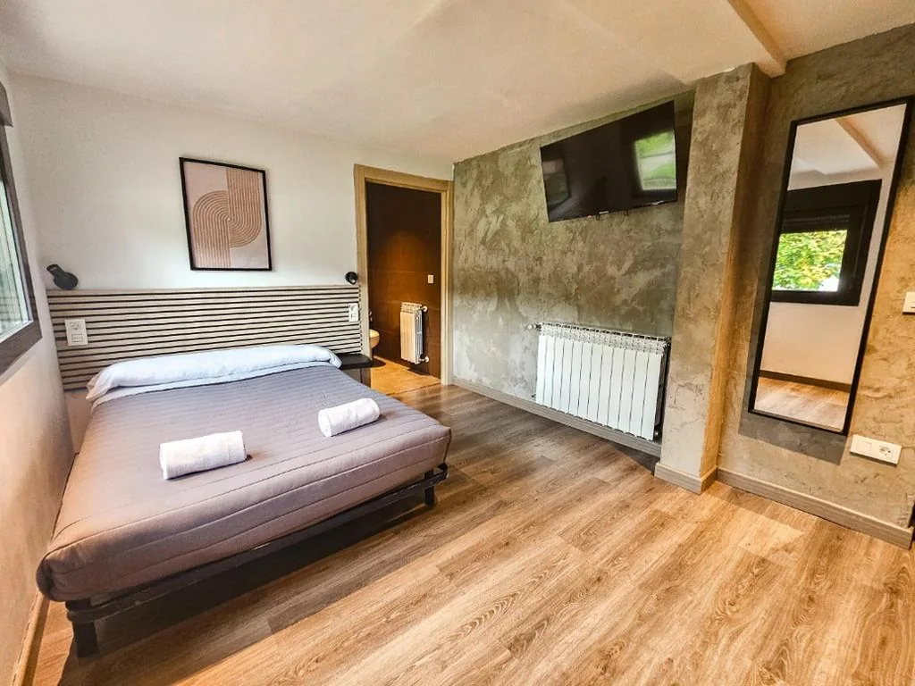 Habitación cuádruple — Hotel Rural Pirineo Jacetania 3000
