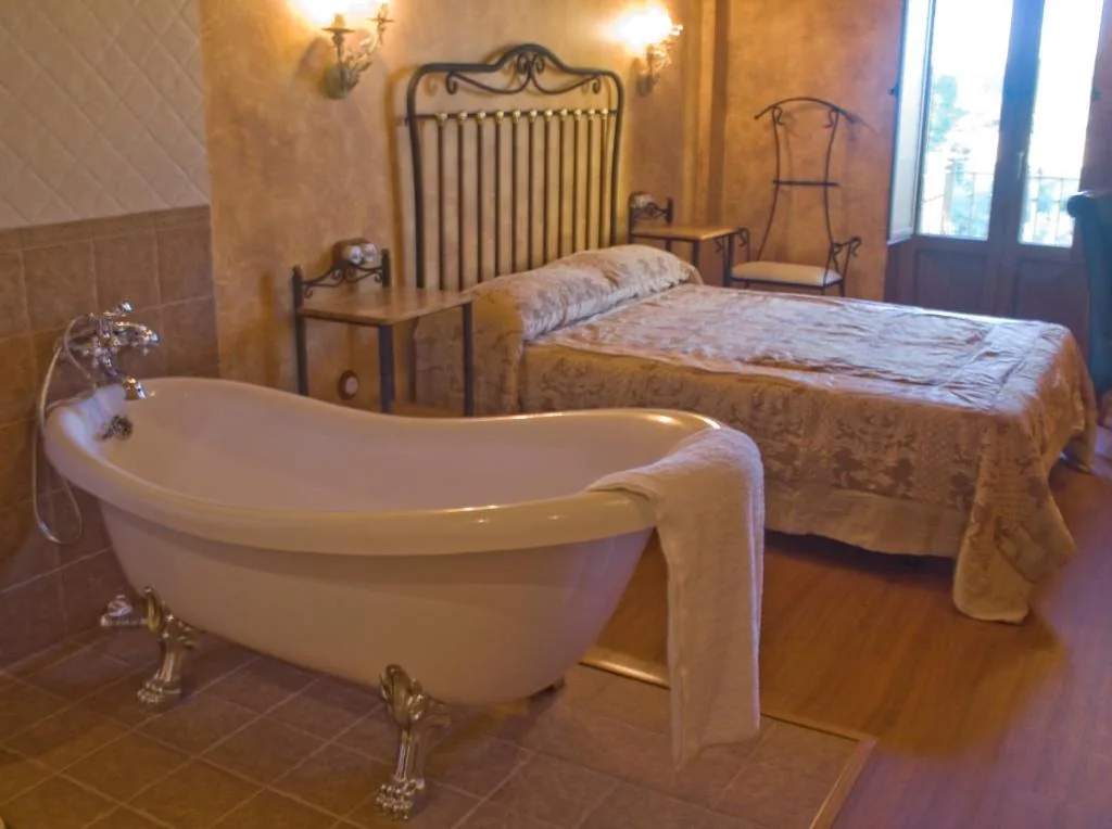 Quarto Triplo (2 adultos + 1 criança) — Hotel Rural y SPA Kinedomus Bienestar