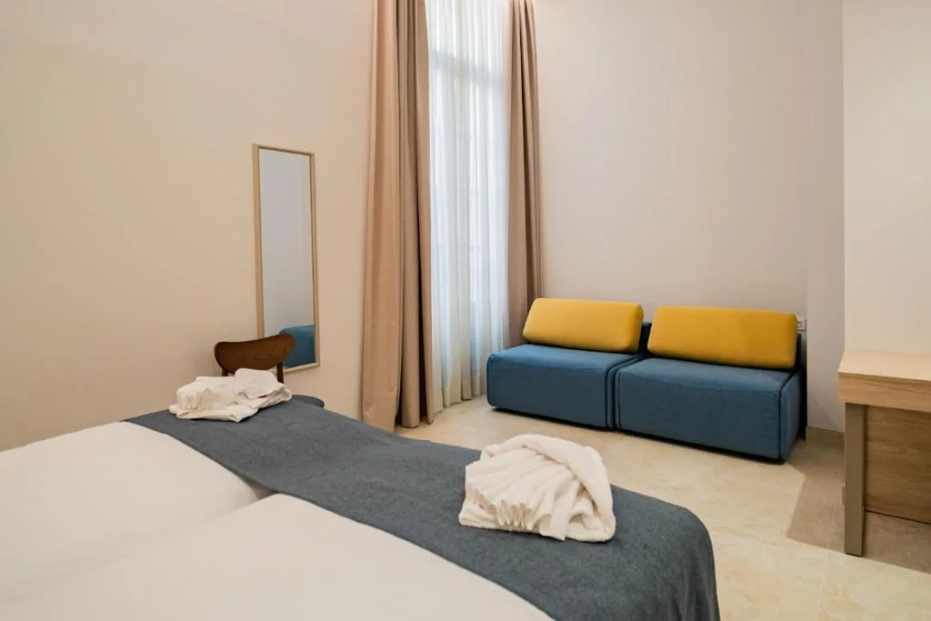 Camera quadrupla — Hotel San Lorenzo Boutique Catedral