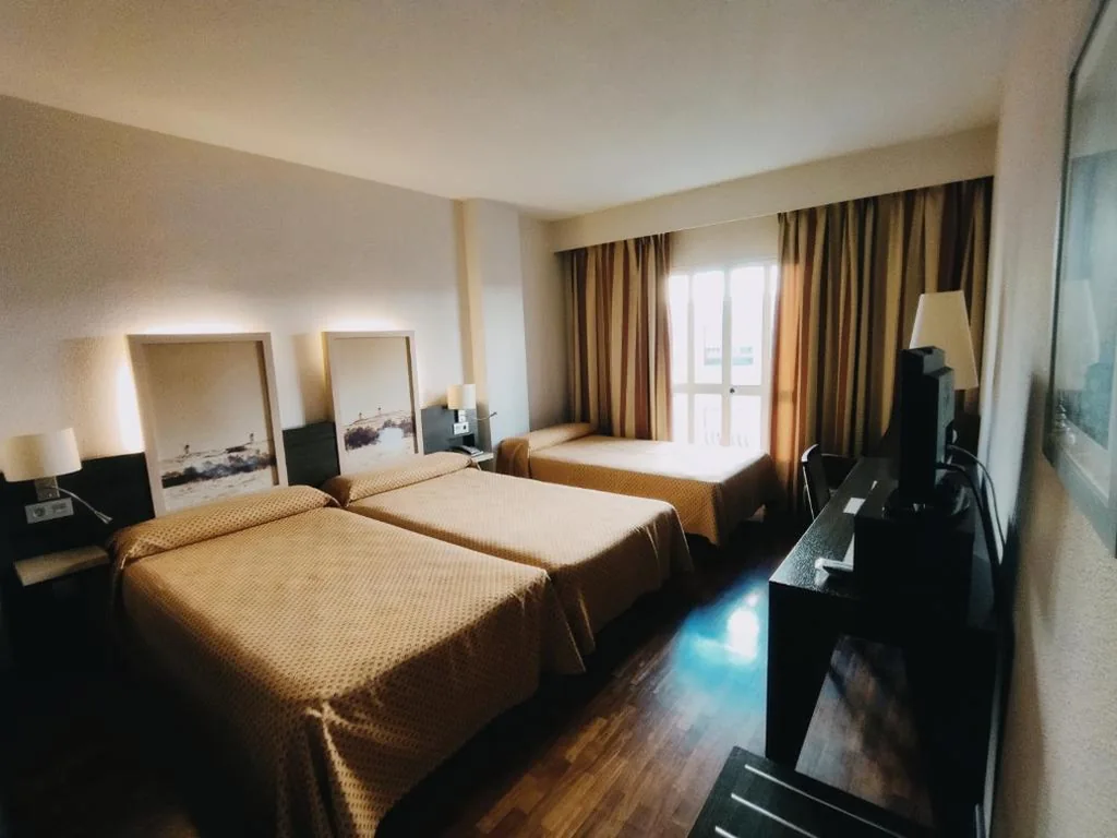 Dreibettzimmer — Hotel Santa Cecilia