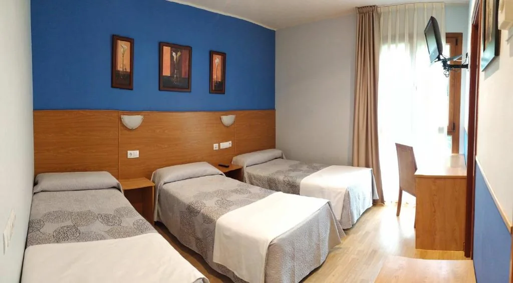 Habitación Triple — Hotel Santa Cristina