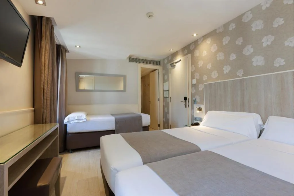 Camera doppia con letto supplementare - 1 o 2 letti — Hotel Santa Marta