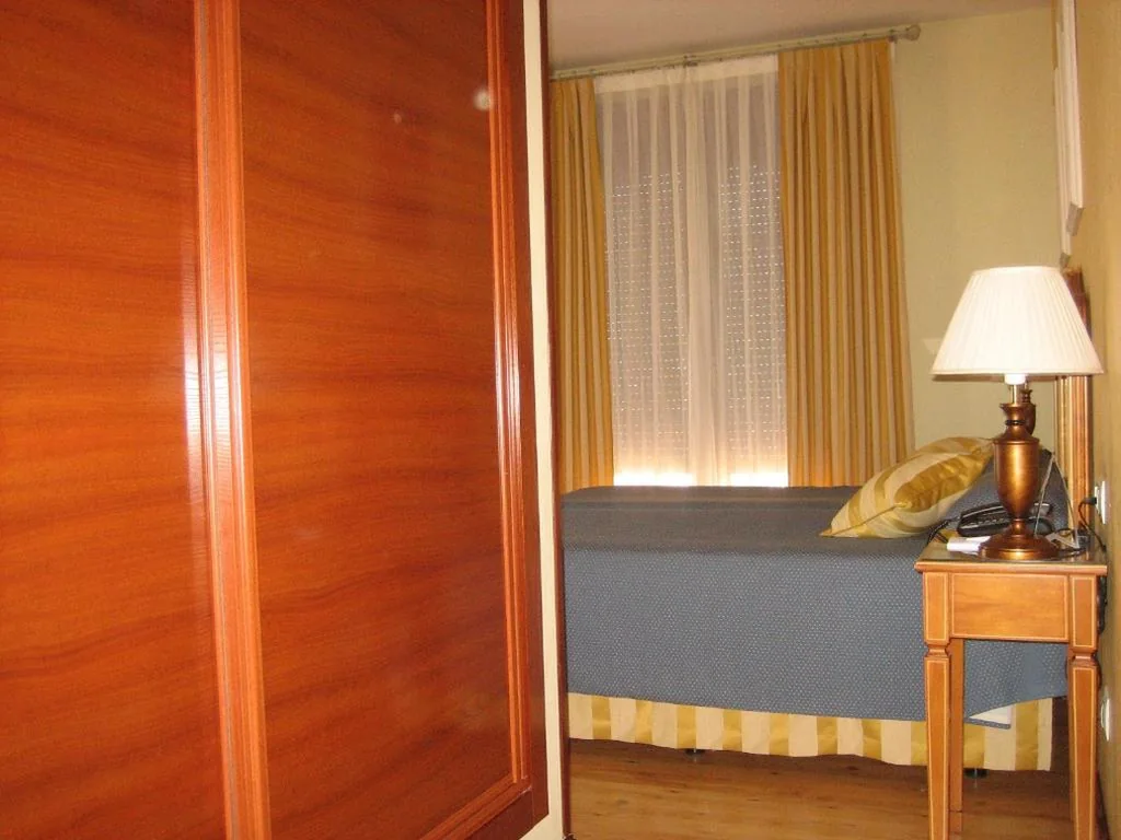 Quarto Individual — Hotel Santiago