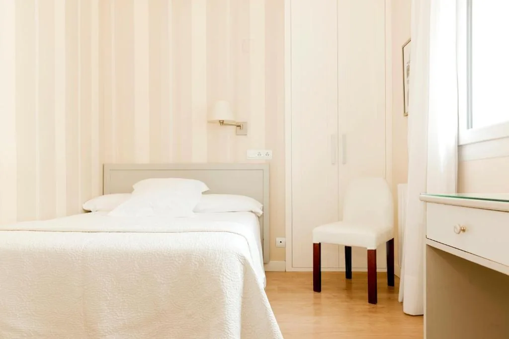 Quarto Individual — Hotel Sauce