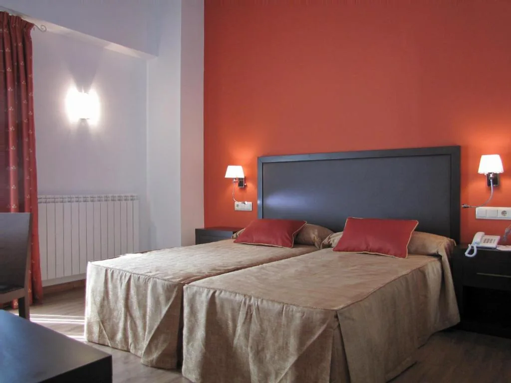 Dreibettzimmer mit Bergblick — Hotel Sesué