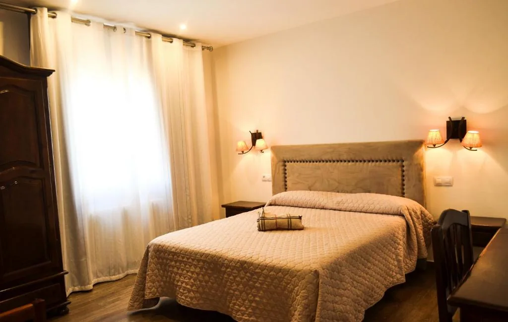 Quarto Deluxe — Hotel Suiza
