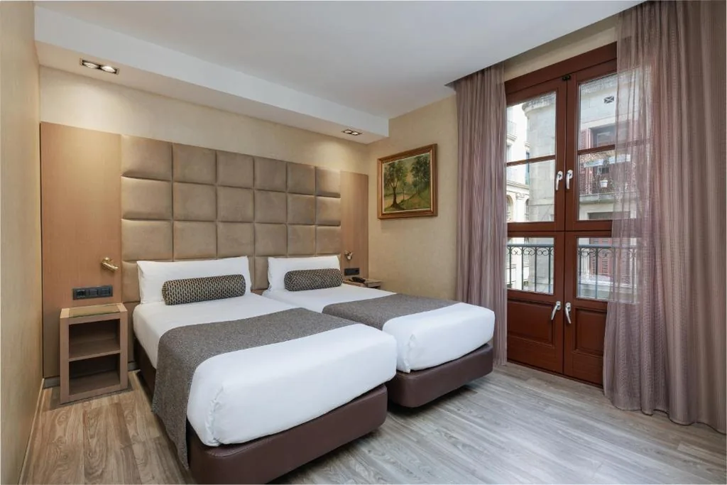 Quarto Duplo — Hotel Suizo