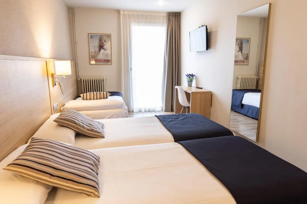 Habitación Triple — Hotel Terminus