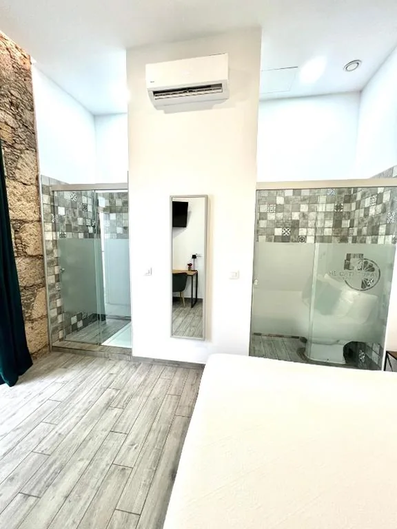Habitación Doble Deluxe (2 adultos + 1 niño) — Hotel The Cathedral Vegueta