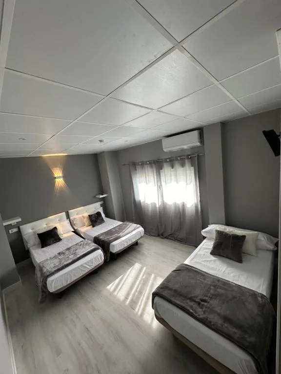 Quarto Triplo — Hotel Vanity