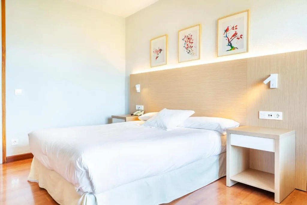 Doppelzimmer mit Zustellbett — Hotel Vejo