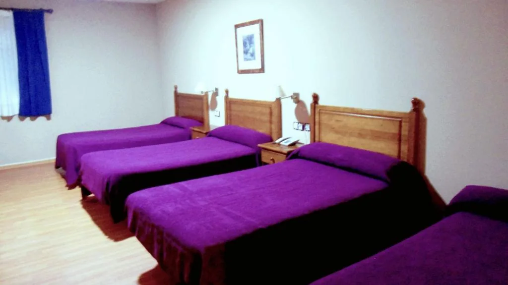 Quarto quádruplo — Hotel Venta El Molino