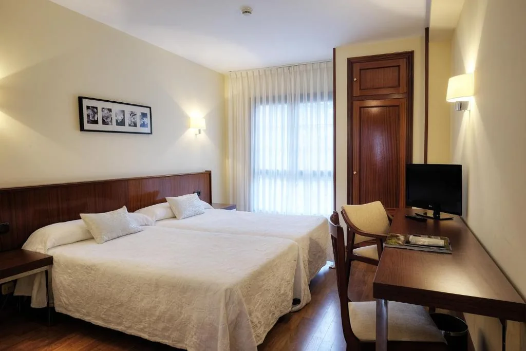 Habitación Doble - 1 o 2 camas — Hotel y Apartamentos Arias