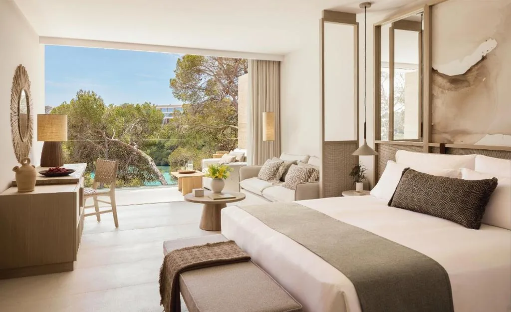 Deluxe Junior Suite Partial Sea View — Ikos Porto Petro