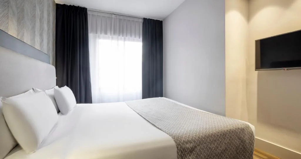 Chambre quadruple — Ilunion Suites Madrid
