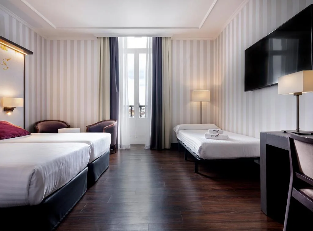 Habitación Doble con cama supletoria - 1 o 2 camas — Intelier Palacio San Martin