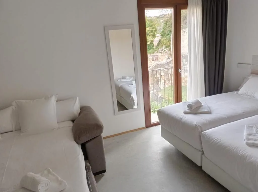 Quarto Quádruplo Deluxe — IRAIPE Estella Rooms Auto Check-in