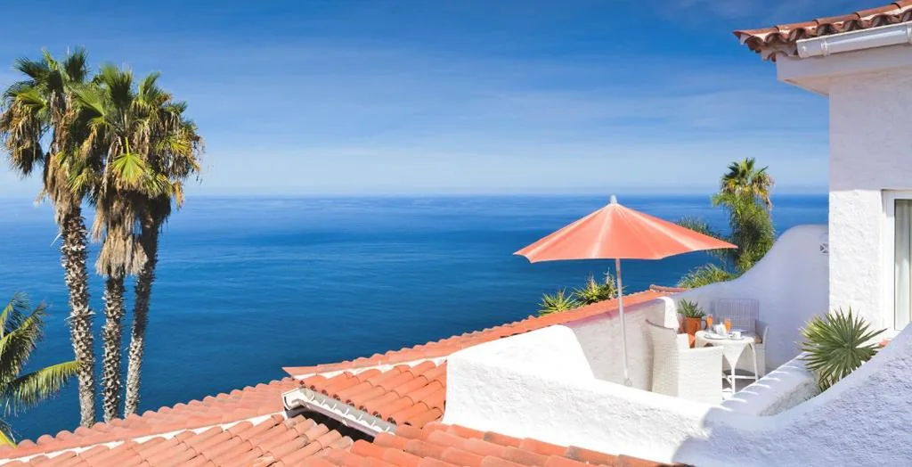 Suite Junior con vistas al mar — Jardin de la Paz